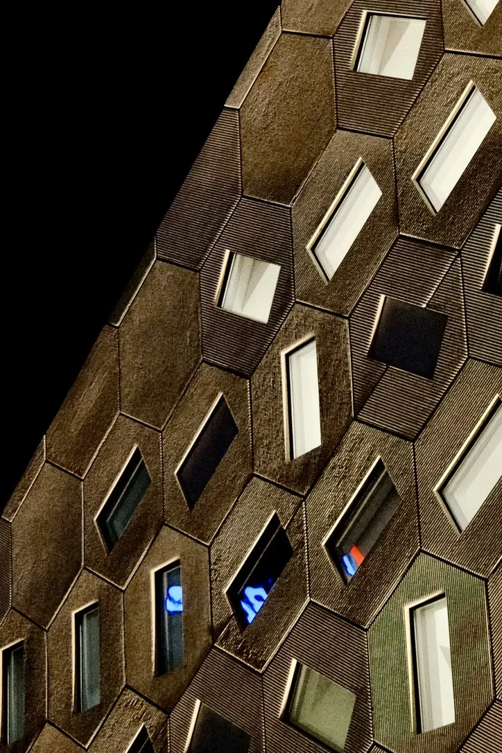 Angular windows on the side of a geometric building in Los Angeles.